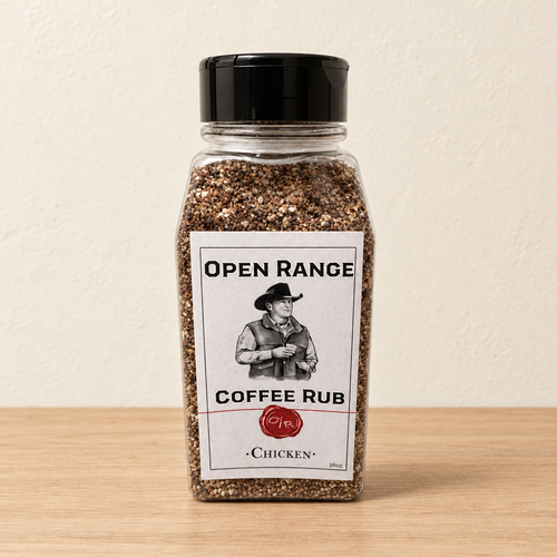 Open Range Coffee Chicken Rub jar on a light oak shelf against a cream wall